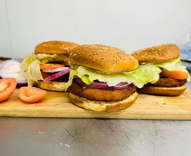 Butter Chicken Pizza - Indian fusion pizza at Pizza 64 Country Hills, Calgary